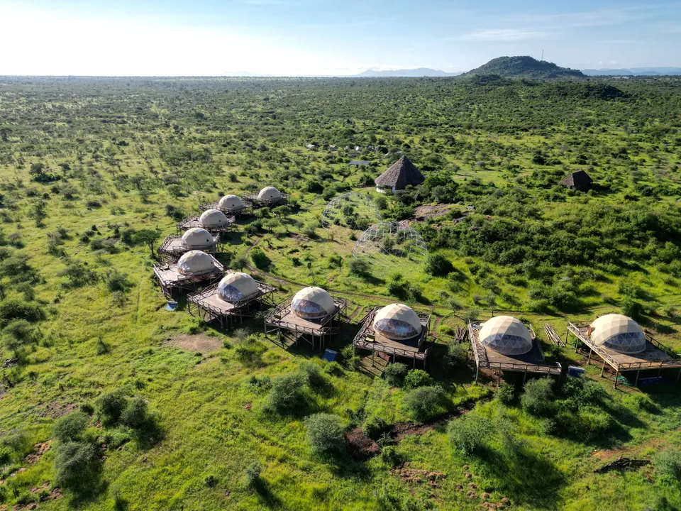 Aerial view of Kuoom wooden dome buildings; not a count of currently available categories