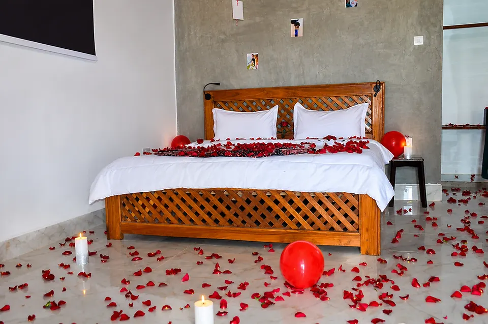 Decorated double-bed room; setup is illustrative