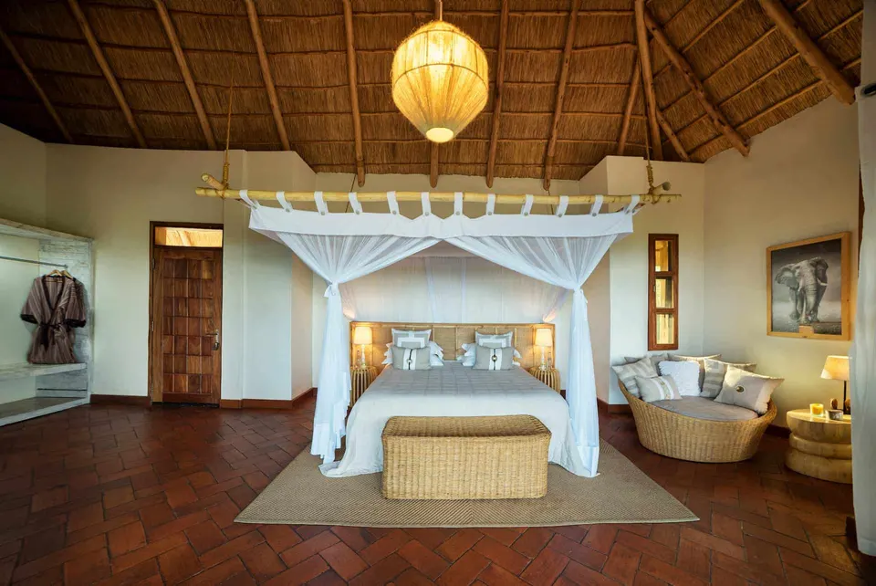 Cottage bedroom with canopy bed
